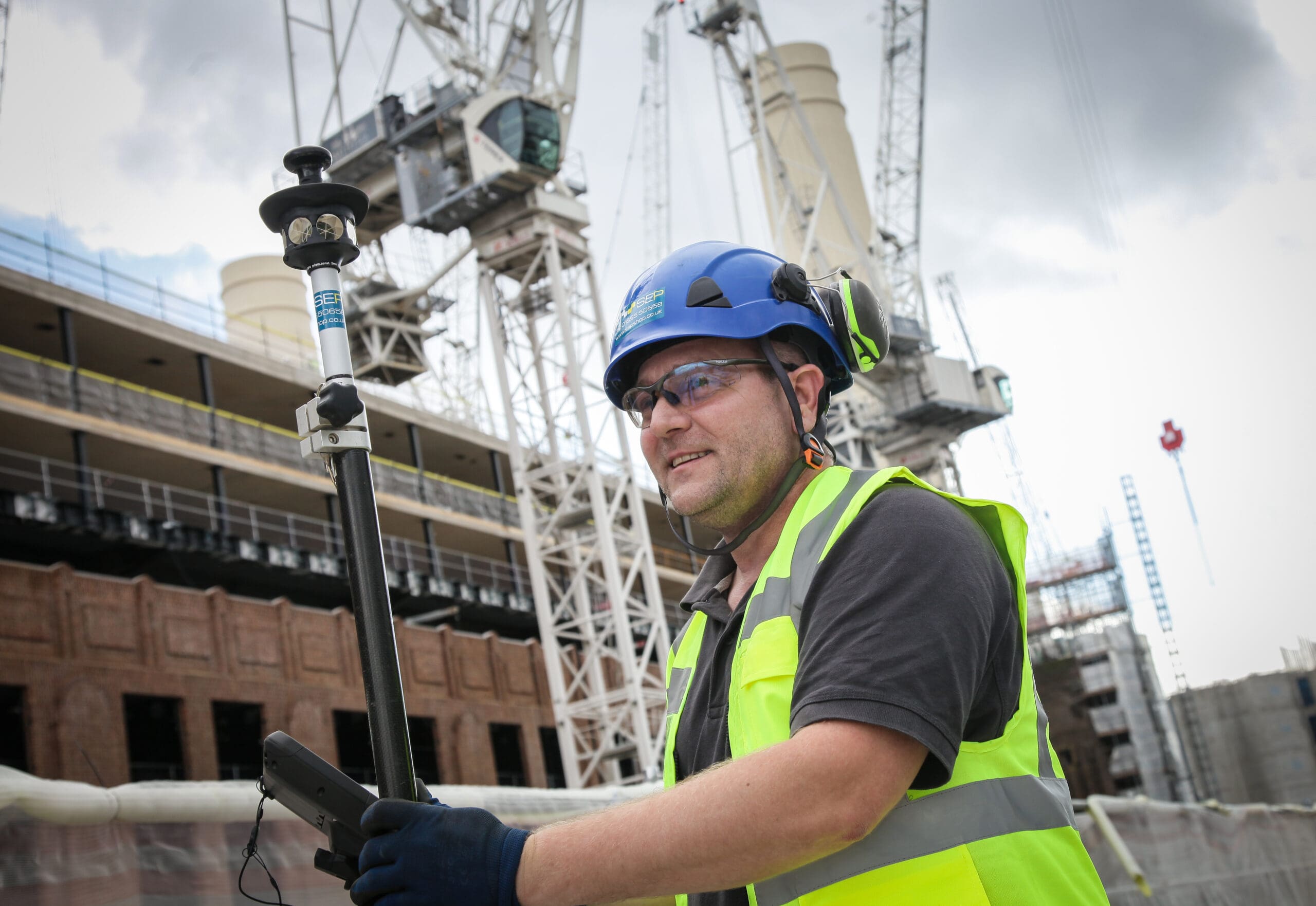 Setting out engineer in Bexley performing site survey and layout